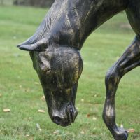 Close-Up of Grazing Horse Sculpture