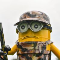 Close-Up of Recycled Metal "Ghillie Suit Soldier" Minion Sculptur