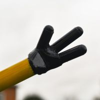 Close-Up of Hand on Recycled Metal "Giddy Gardener" Henchman Sculpture