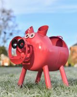 vibrant pink pig planter