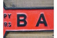 "Happy Hours" Red Iron Bar Sign Close-Up