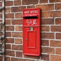 Red "King George" Rex Post Box Front in Situ on a Brick wall