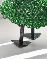 Close up of feet detail on recycled metal art sculpture
