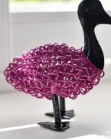 Close up of colourful body detail on recycled metal art sculpture