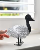Scale image of recycled metal art sculpture