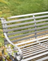 Close-Up of Grey Robust “Chatham" Three Seater Park Bench