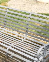 Close-Up of Grey Finish on Wrought Iron Three Seater Park Bench