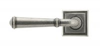 Rounded Pewter Lever Door Handle on Square Rose