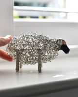 Scale image of recycled metal art sculpture