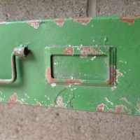Close-up of the Rustic Green Finish on the Tray Wall Shelves