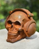 Rusted Cast Iron Skull wearing Headphones Garden Ornament