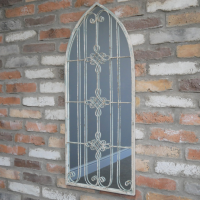 Rustic Arch Wall Mounted Mirror in situ on a Brick Wall