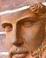 Close-Up of Rustic Cast Iron "Adonis Greek" Exterior Wall Art