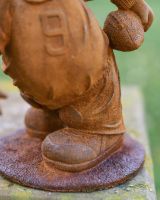 Close-Up of Freestanding Base on Cast Iron Pig Sculpture
