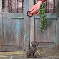 Rustic Cast Iron Dog Door Stop to Scale