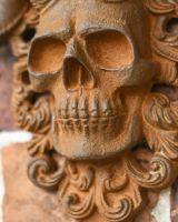 Close-Up of Rustic Cast Iron "El Diablo" Exterior Wall Art