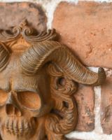 Close-Up of Detailed Cast Iron "El Diablo" Exterior Wall Art