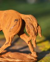 Close-Up of Rustic Cast Iron "Horse in Gallop" Garden Sculpture