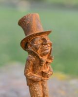 Situ Shot of Rustic Cast Iron "Old Codger" Freestanding Garden Sculpture