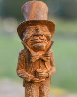 Close-Up of Facial Detail and Expression on Old Codger Sculpture