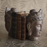 Rustic Effect Buddha Head Bookends in Situ