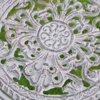 Close-up of the Ornate Design on the Back of the Seat