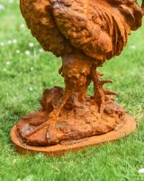 Close up of Rustic Rooster Cast Iron Sculpture base