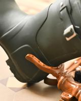 Close-Up of Boot Removal Tool in Use