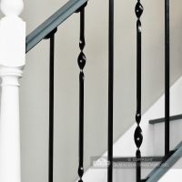 Black Iron Stair Spindle Sets Installed In Modern Staircase