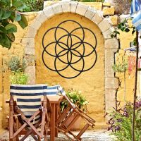 Black "Seed of Life" Steel Wall Art in Situ Outdoors