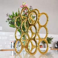 Side view of "Floating Bubbles" Wine Rack in Gold 