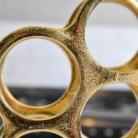 Close up of bottle holder on "Floating Bubbles" Wine Rack 