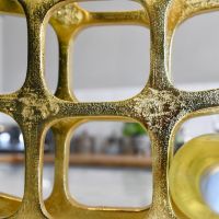 Close up of grid pattern on Gold "Kempton House" 