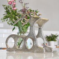 Side view of Antique Nickel "Laying Stag" Wine Rack in Kitchen 