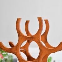Close up of wine bottle holder on rustic "Branches" Wine Rack