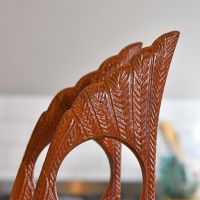 Close up of tip of "Angel Wings" Wine Rack