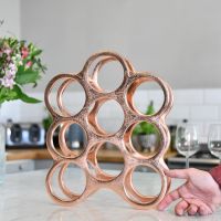 Copper "Floating Bubbles" Wine Rack on Kitchen Countertop 