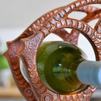 Close up of fish face on rustic wine rack 