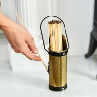 Scale image of bronze match stick holder