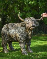 Scale image of highland cow garden sculpture