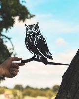 Scale image of metal owl tree spike