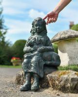 Scale image of "The Girl and Her Dog" Sitting Garden Wall Sculpture
