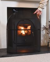 Scale image of fire guard with mesh and handle detail