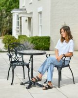 Scale image of mediterranean mosaic tiled outdoor dining set