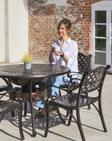 scale of 5 piece patio dining set with fire pit centre 