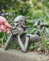 Scale image of daydreaming pixie patio statue