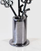 Close up of Scrap Metal Flower Pot Sculpture base