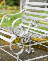 Close Up Of Scrolled Bench Legs 