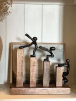 Front view of home decor sculpture
