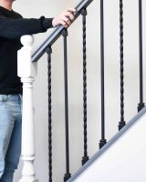Scale Shot of Set of 2 Matte Black "Enfield" Steel Stair Spindles - Pattern 11